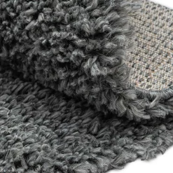 Grauer Hochflor Teppich Fachet