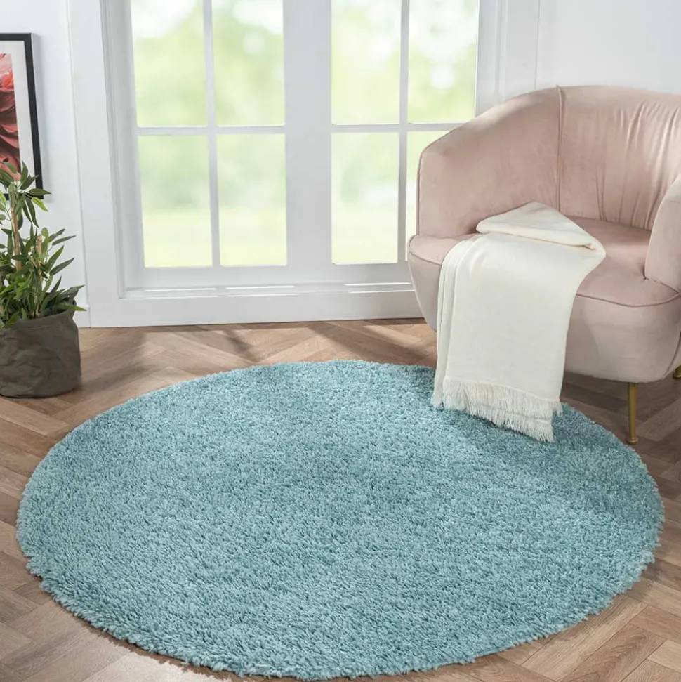Hellblauer Hochflor Teppich Kairawan