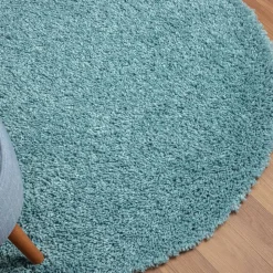 Hellblauer Hochflor Teppich Kairawan
