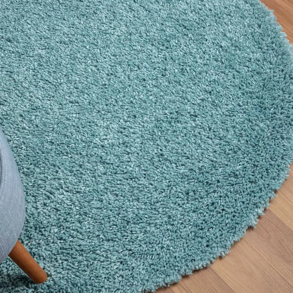 Hellblauer Hochflor Teppich Kairawan