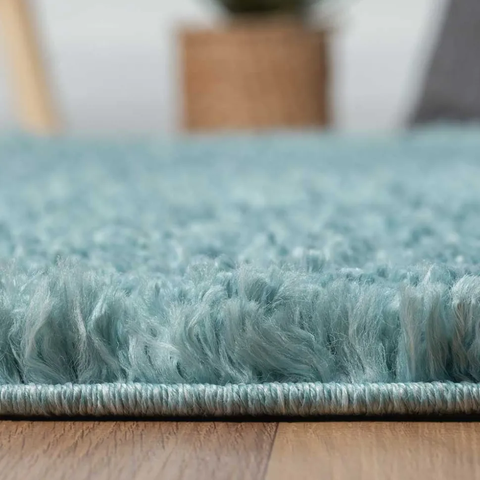 Hellblauer Hochflor Teppich Kairawan